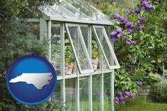 north-carolina map icon and a garden greenhouse