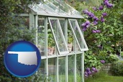 oklahoma map icon and a garden greenhouse